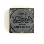 Forside av liten Coca-Cola klisjé for annonse